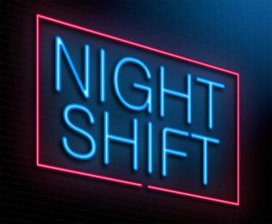 A neon sign that reads, "Night shift."