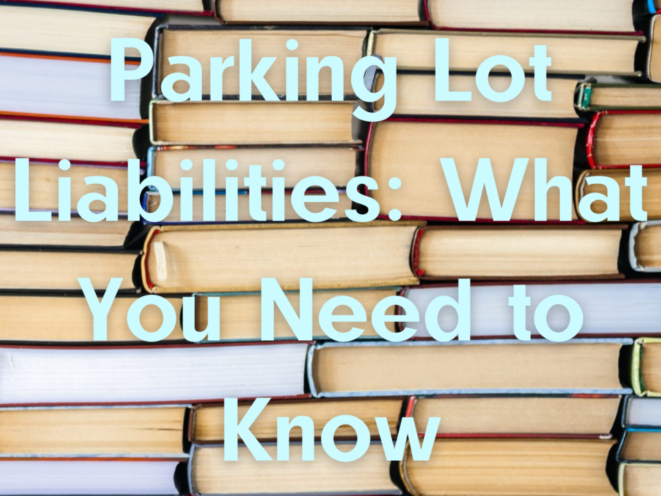 An image of books with the text: Parking Lot Liabilities What You Need to Know