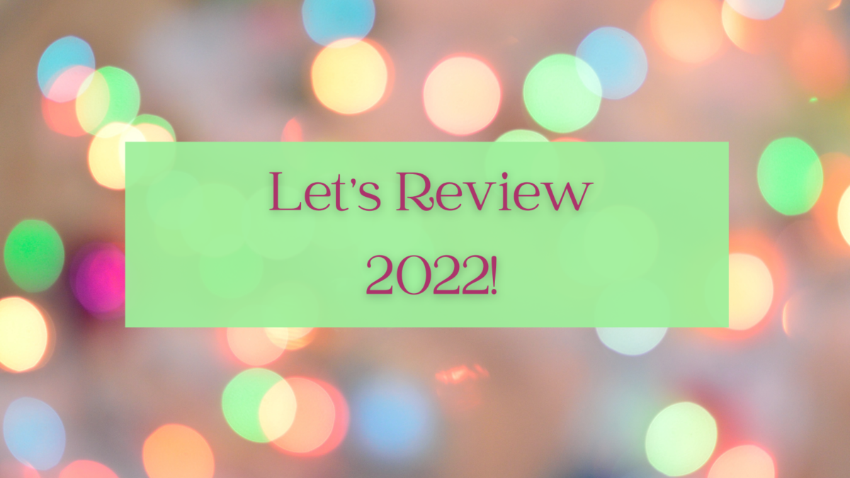 An image with some festive lights with text that reads: Let's Review 2022!