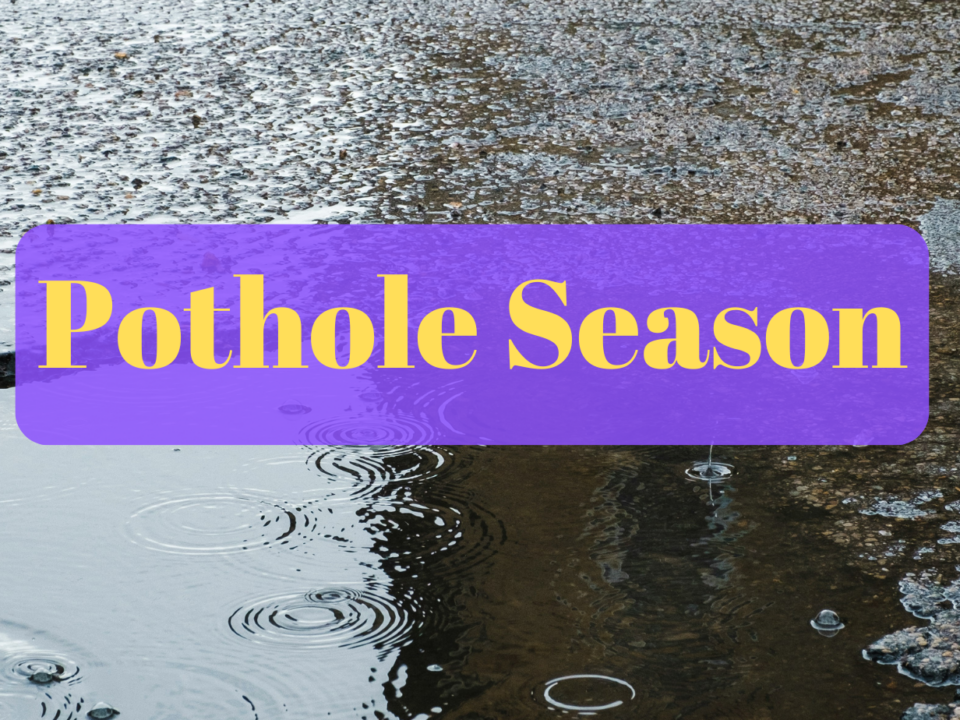 A photo of a pothole filling with rain with the text: Pothole Season.